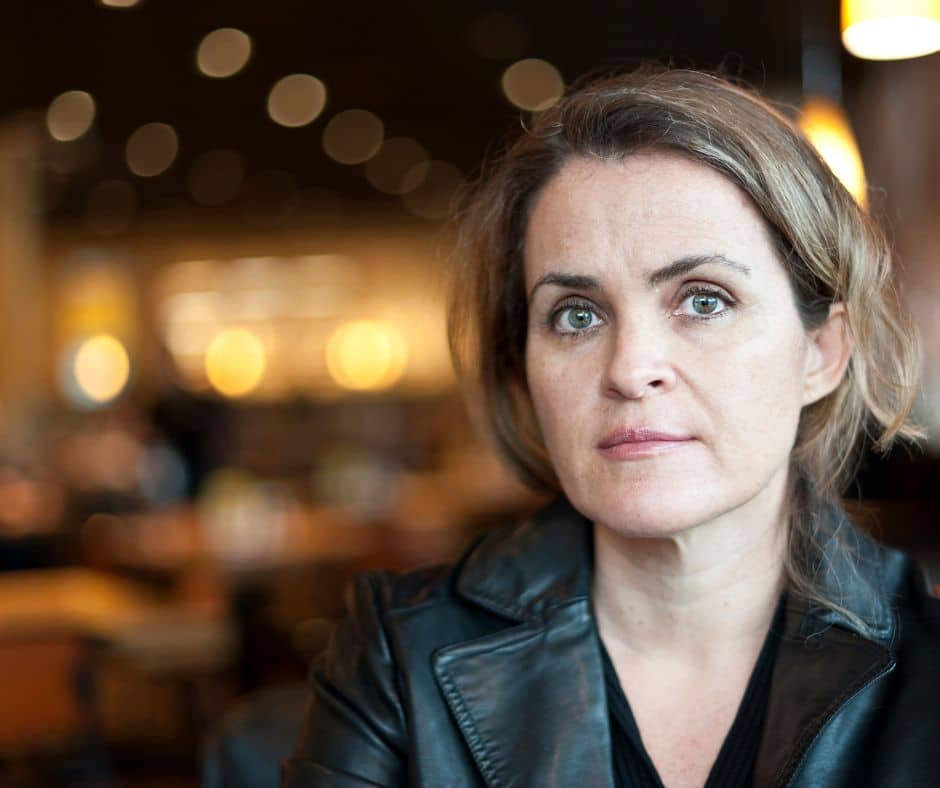 A portrait of a woman looking into the camera.