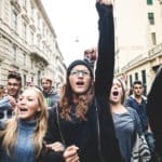 People marching together in the street