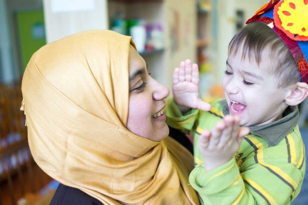 Woman and child laughing