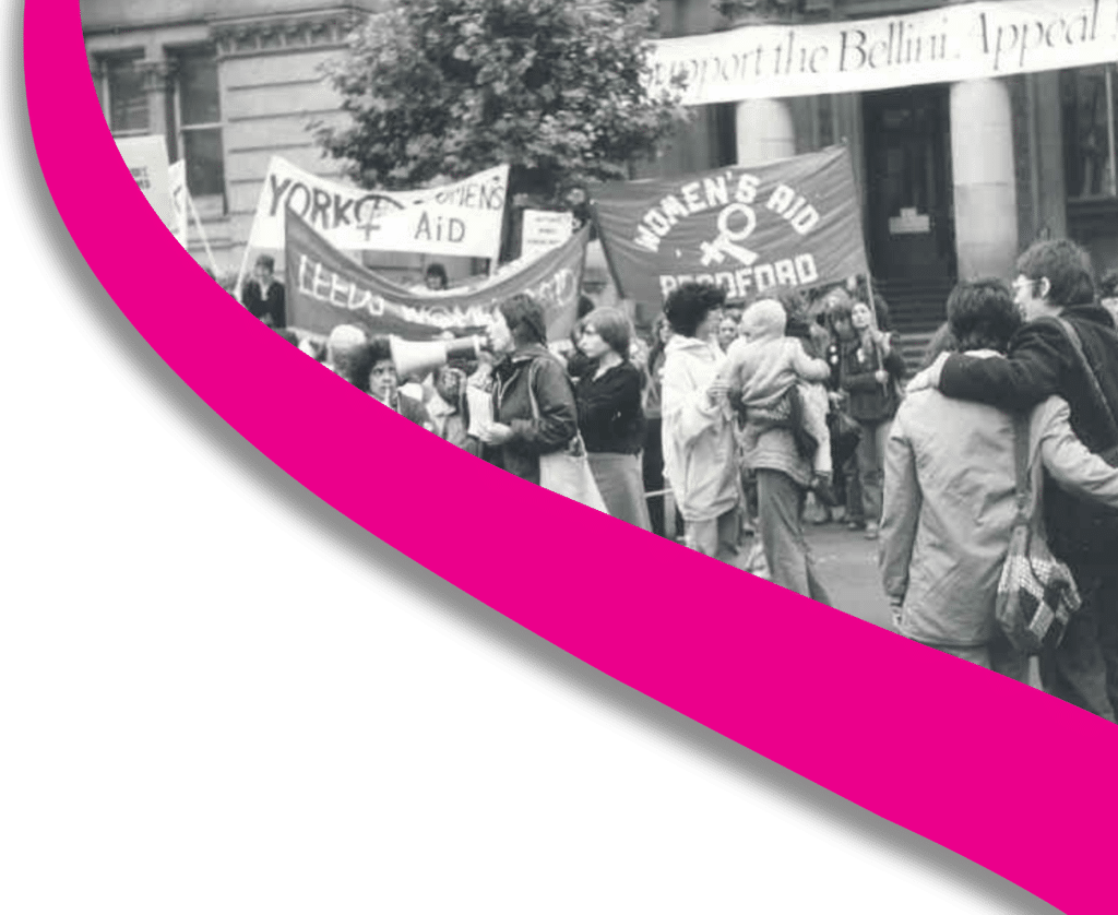 A black and white image of people protesting