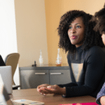 Group of women chatting around a table